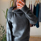 Grey Draped Shoulder Pullover With Silver Appliqué